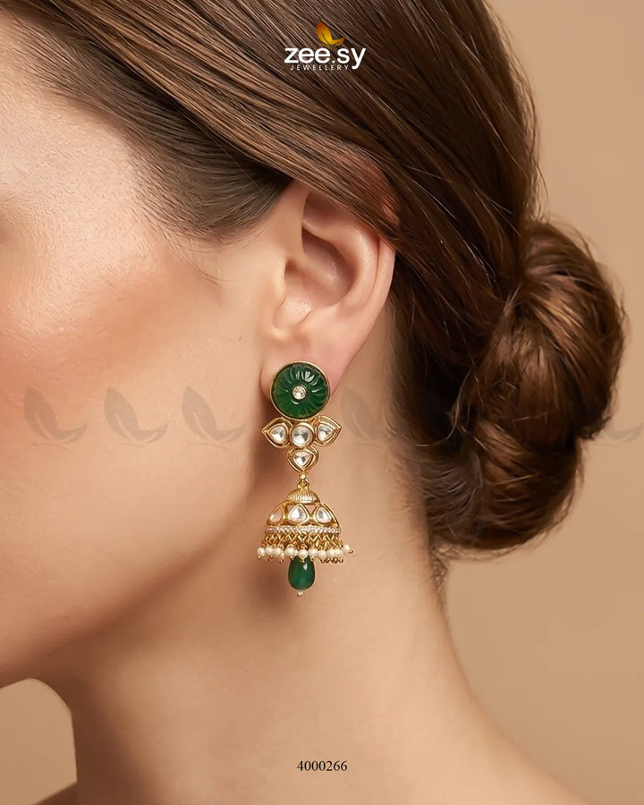 Green Radiance Pearl Jhumki choker set with intricate design, featuring pearls and traditional jewelry elements.