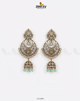 Rich Chandbali zirconia earrings featuring intricate design and sparkling stones, perfect for elegant occasions.