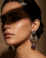 Rich Chandbali zirconia earrings featuring intricate design and sparkling stones, perfect for elegant occasions.