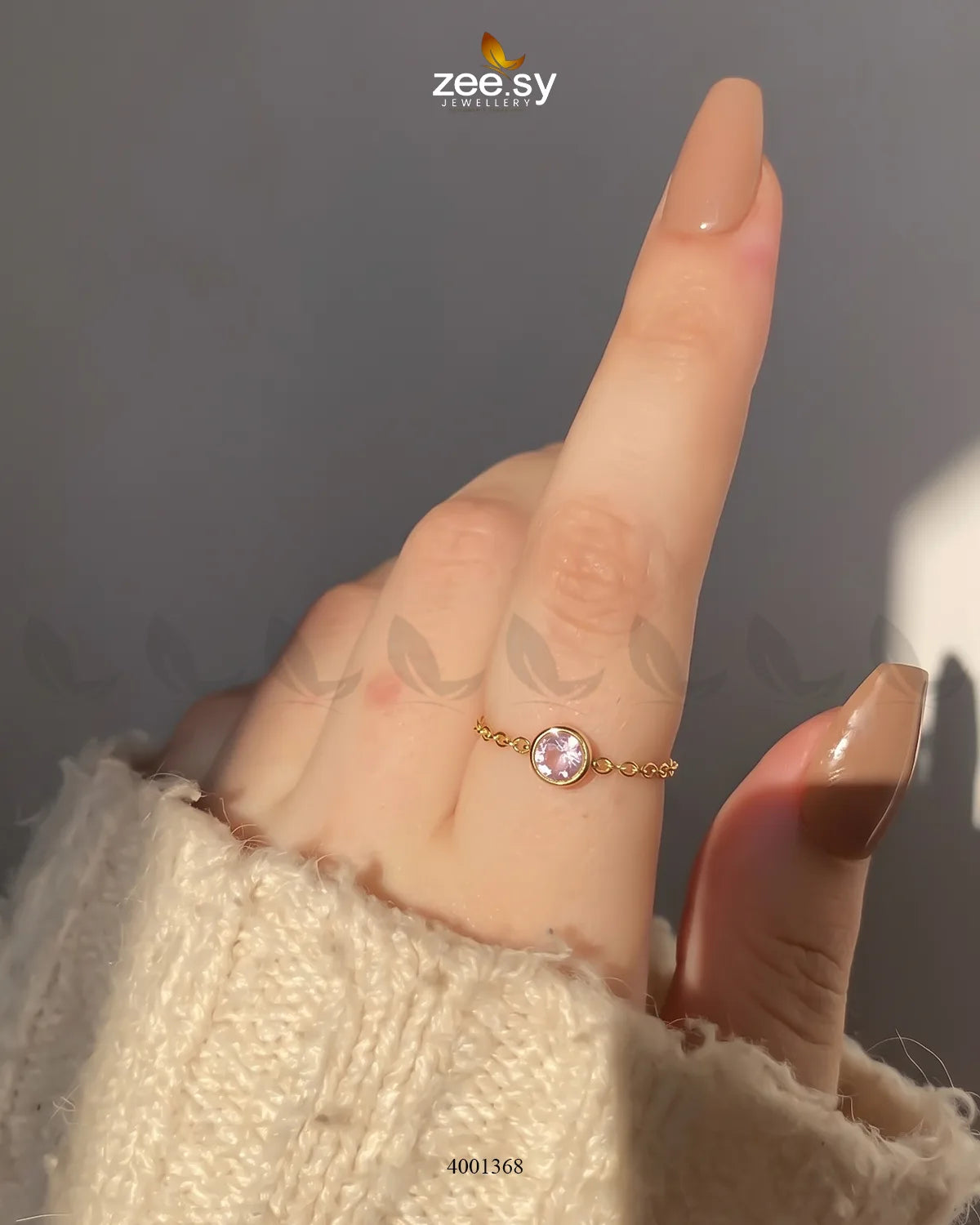AJ03 Scarlet round stone finger ring with a pink mint-colored gemstone, showcasing a stylish and elegant jewelry design.