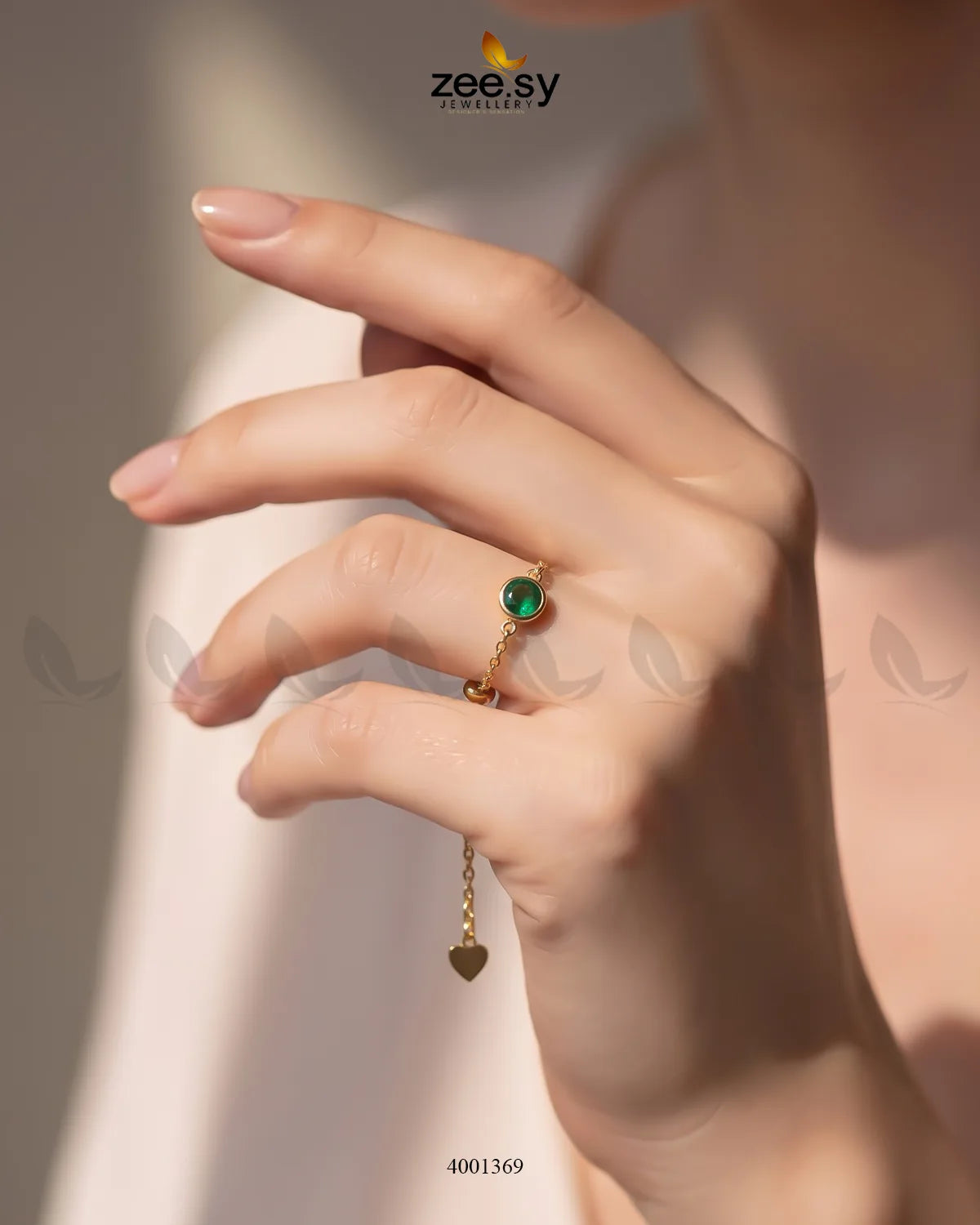 AJ03 Scarlet round stone finger ring with vibrant green gemstone and sleek silver band, showcasing elegant jewelry design.