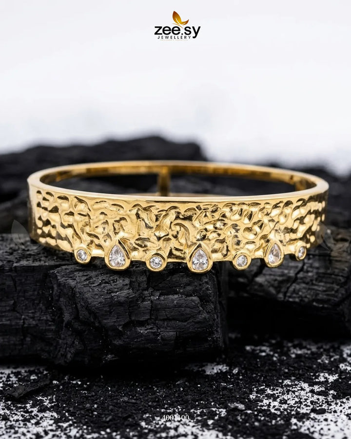 Sculptural textured crystal cuff bracelet by MH26 featuring intricate design and sparkling crystal accents.