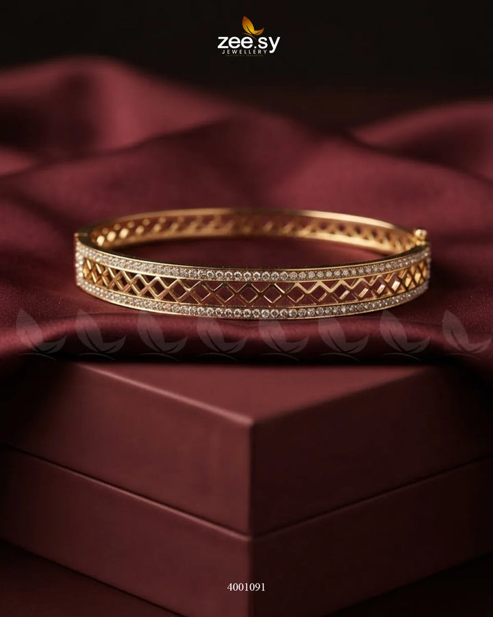 Bright openwork crystal cuff bracelet by MH26, featuring a sleek design with sparkling crystals and intricate metalwork.
