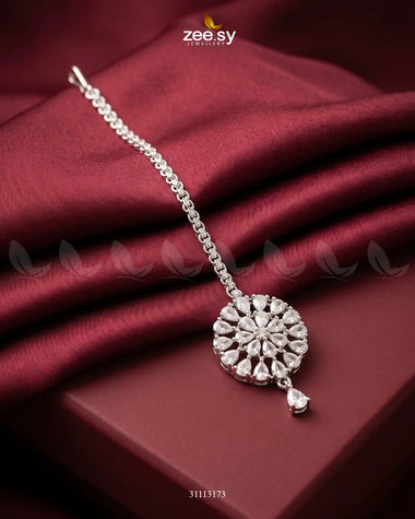 Red Solis Bindiya by RHS09 featuring a traditional decorative design for Indian cultural attire.