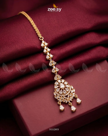 White Sorelle Bindiya from RHS09 brand, traditional decorative bindiya for festive or everyday wear.