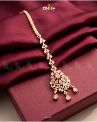 Mint pink Sorelle Bindiya RHS09 bindiya with intricate design, perfect for traditional Indian adornment.