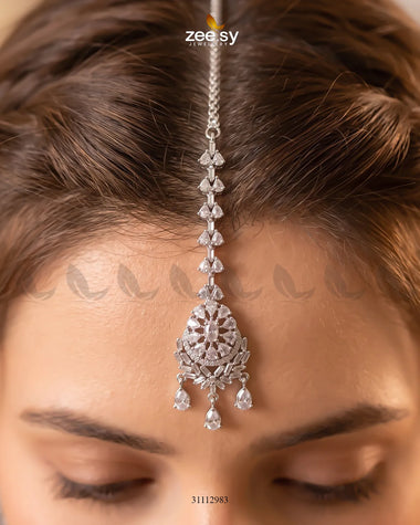 White Sorelle Bindiya by RHS09, traditional decorative bindiya with intricate design, worn on the forehead for cultural occasions.