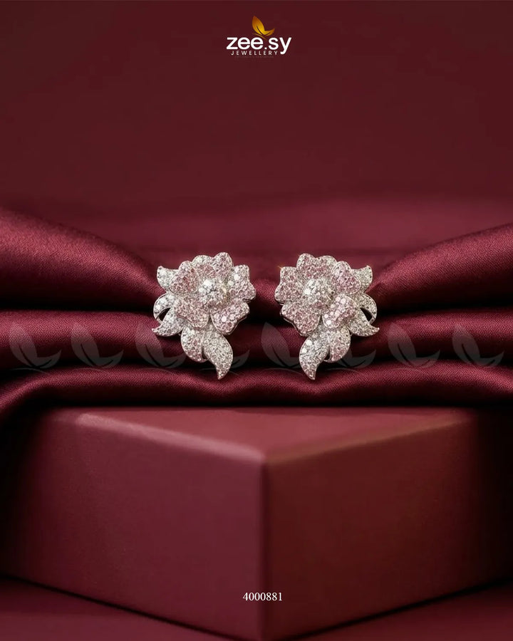 RHS09 sparkling American diamond earrings in silver with mint pink accents