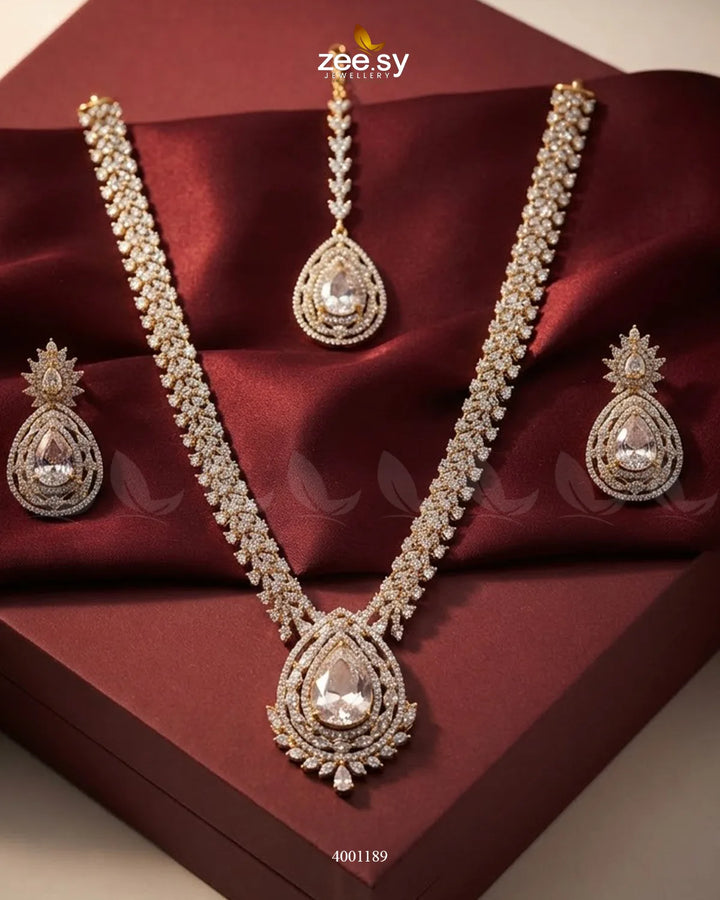 Sparkling amber crystal necklace set by RHS09 featuring white beads and a matching elegant jewelry design.
