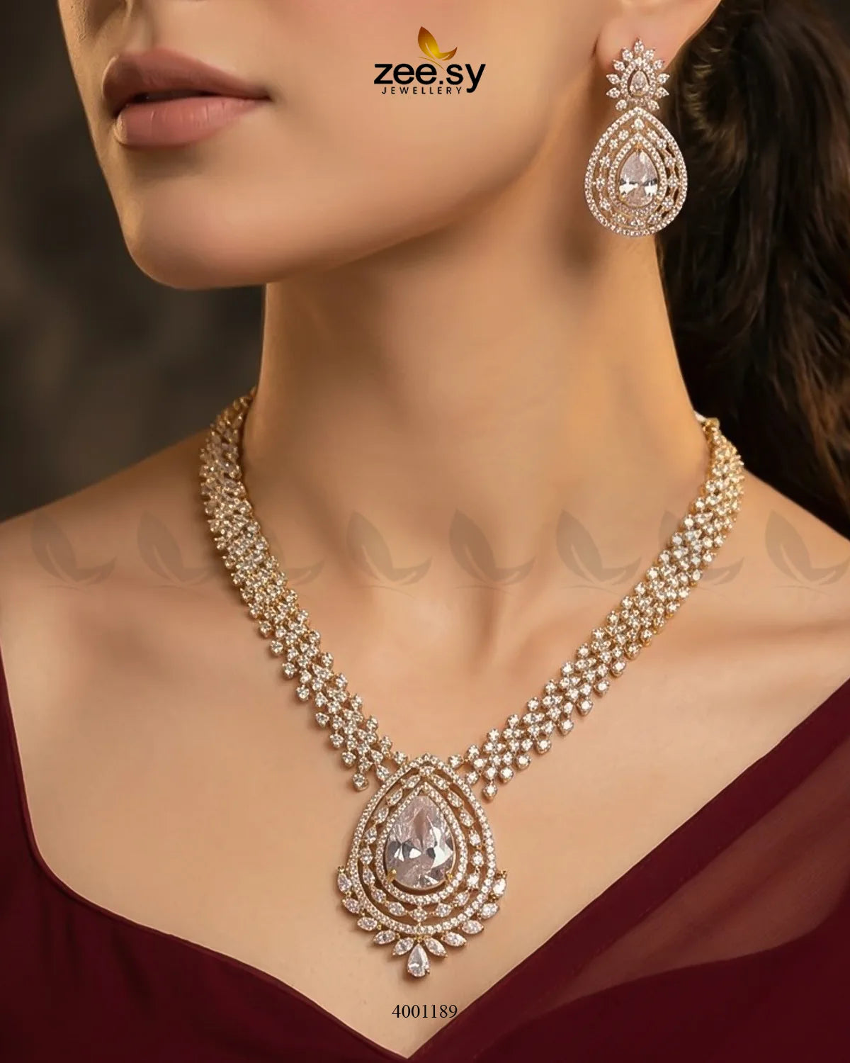 Sparkling amber crystal necklace set by RHS09 featuring a white and gold-tone design with elegant, shimmering stones.