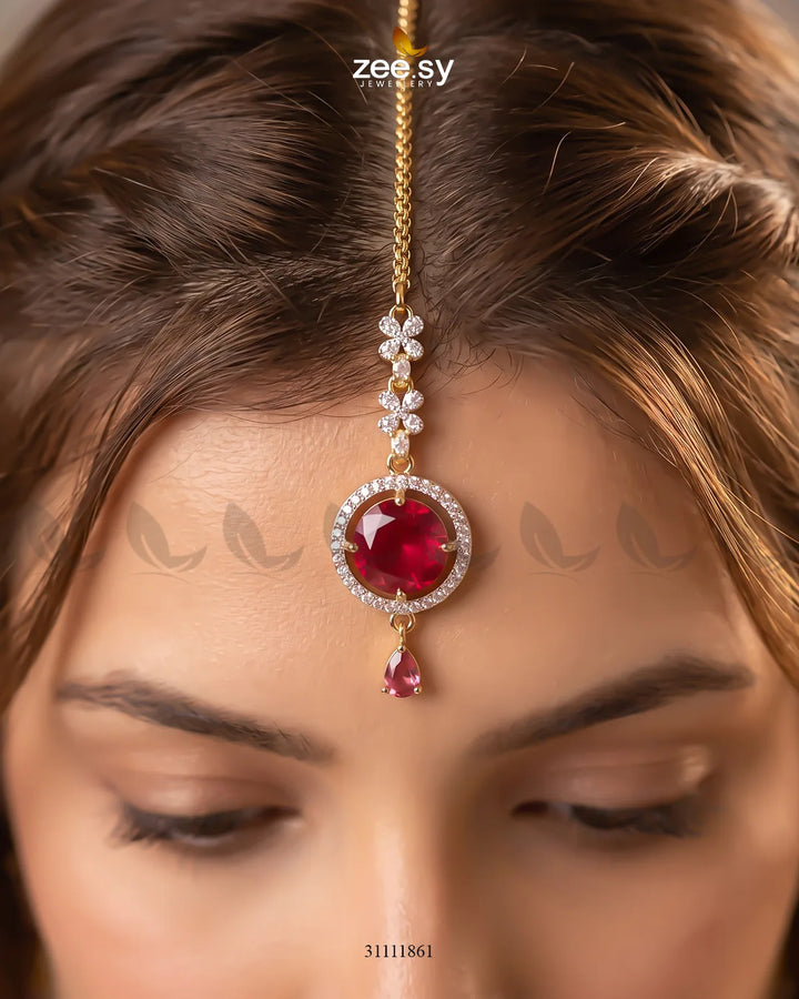 Fuchsia Talia Bindiya from RHS09 featuring intricate design, perfect for traditional Indian jewelry and accessory styling.