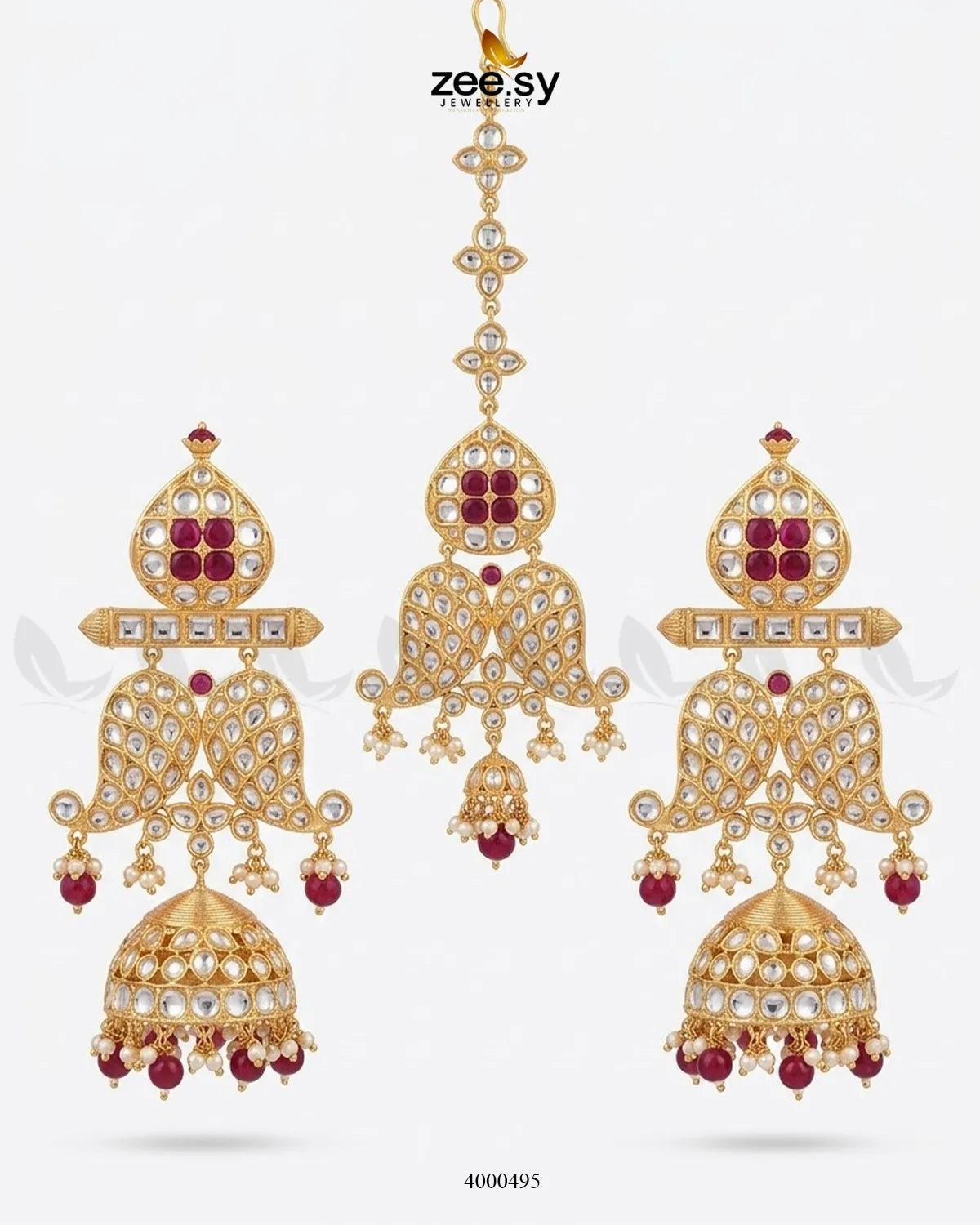 Traditional Polki Jhumki earrings with intricate gold detailing and dangling pearl accents, handcrafted by RHS09.