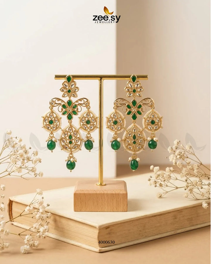 Vintage beaded Kundan earrings featuring intricate designs, crafted by RHS09, showcasing traditional Indian jewelry craftsmanship.