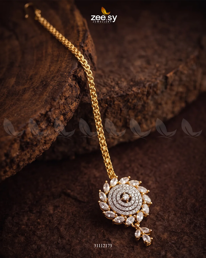 White Zayna Bindiya from RHS09, traditional decorative bindiya for festive and cultural occasions.