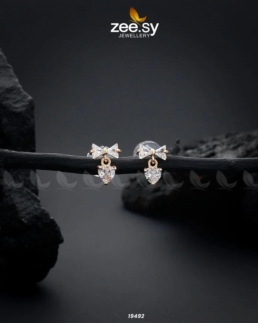 Crystal Bow Stud Earrings Golden Earrings - Zeesy Jewellery Pakistan | Premium Artificial & Imitation Jewellery