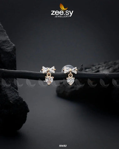 Crystal Bow Stud Earrings Golden Earrings - Zeesy Jewellery Pakistan | Premium Artificial & Imitation Jewellery