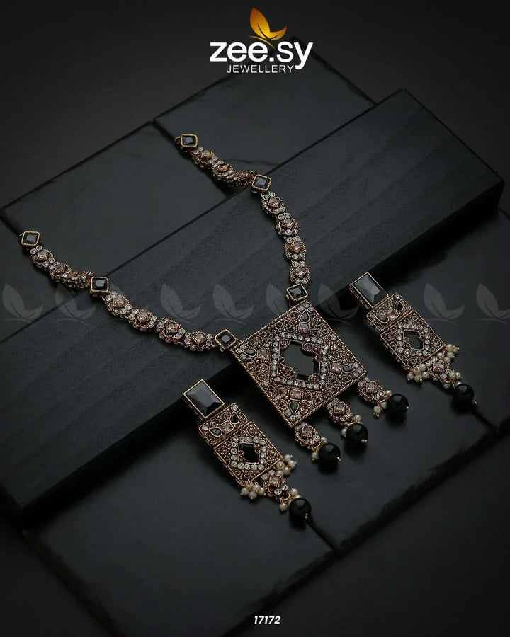Captivating Crystals Necklace Golden Black Necklace Sets - Zeesy Jewellery Pakistan | Premium Artificial & Imitation Jewellery