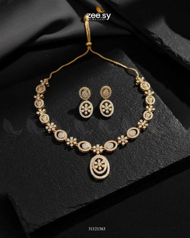 Dainty Oval Floral Necklace Set Golden Necklace Sets - Zeesy Jewellery Pakistan | Premium Artificial & Imitation Jewellery